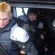 An image from Final Fantasy VII: The First Soldier depicting three soldiers preparing to jump out of a helicopter.